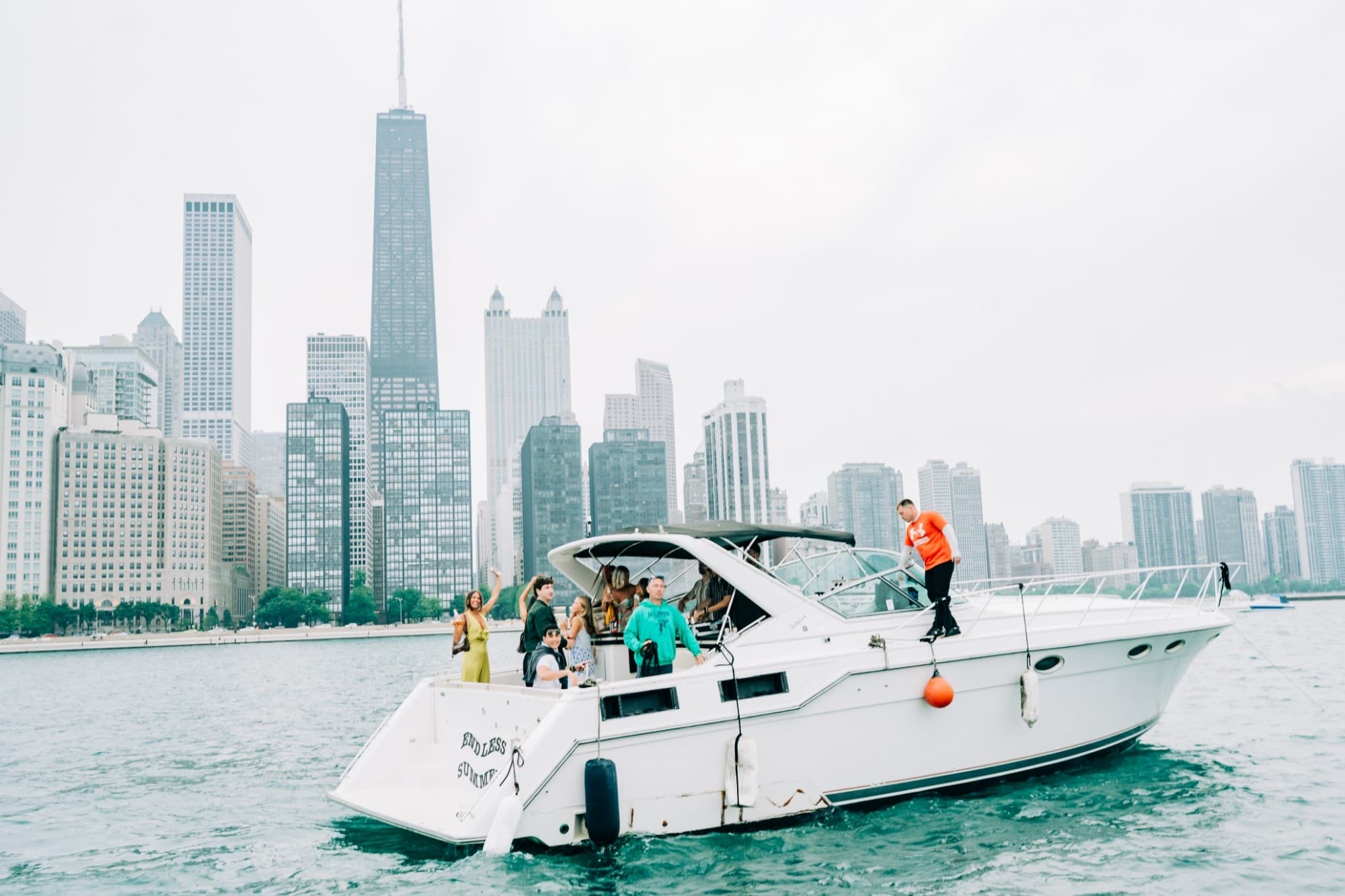 A Playpen charter cruising beside the Chicago skyline