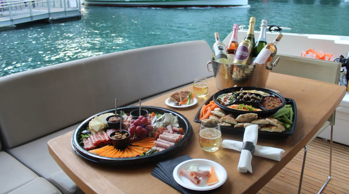 City Winery Riverwalk catering platters, crudité, and champagne on ice served aboard a boat