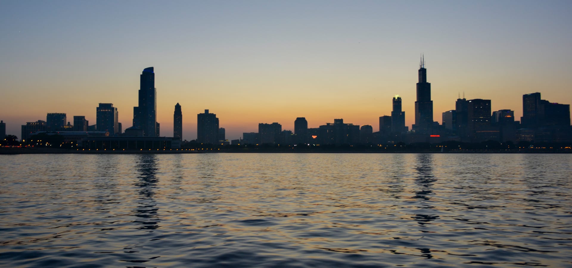 Chicago skyline from Lake Michigan at sunset